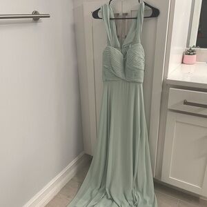Beautiful mint green gown. NWT. Size 5.  Flowy and so pretty!
